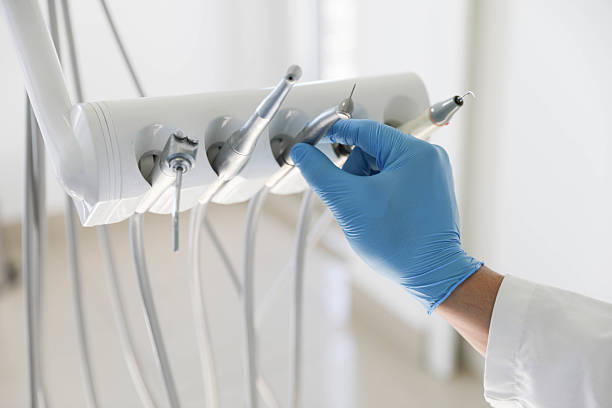 Professional Tooth Extraction technician working in Augusta, ME